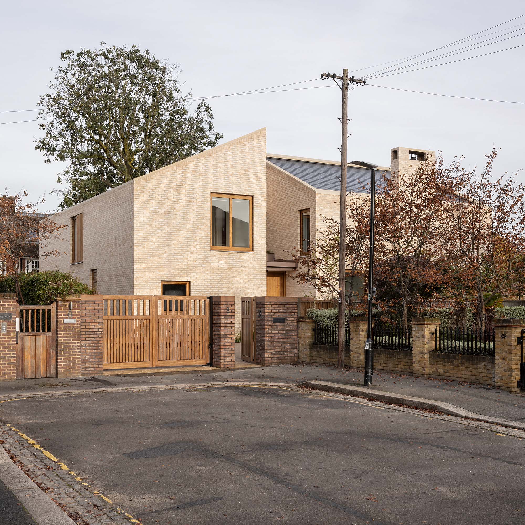 Erbar Mattes Architects Wimbledon custom new build contemporary modern timber frame brick house villa conservation area street view